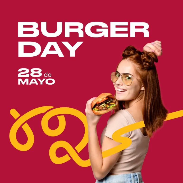 Chica sonriendo con hamburguesa